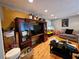 Cozy living room features hardwood floors and a gray sofa at 3034 Kent Ct, Duluth, GA 30096