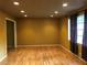 Bright living room with hardwood floors and recessed lighting at 3034 Kent Ct, Duluth, GA 30096