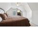 Bedroom with white walls and a brown comforter and ceilings fan at 3223 Thornecreek Dr, Douglasville, GA 30135