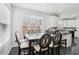 Bright breakfast nook area with table and chairs near kitchen at 3223 Thornecreek Dr, Douglasville, GA 30135