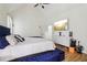 Bright main bedroom featuring a luxurious bed, white dresser, and modern decor at 3223 Thornecreek Dr, Douglasville, GA 30135
