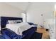 Bright main bedroom featuring a luxurious bed, a fireplace, and modern decor at 3223 Thornecreek Dr, Douglasville, GA 30135