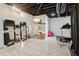 Spacious finished basement recreation room featuring laminate wood flooring at 3223 Thornecreek Dr, Douglasville, GA 30135