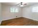 Bright bedroom with hardwood floors and two windows at 460 E Kildare Nw Ave, Atlanta, GA 30318
