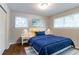 Comfortable bedroom with hardwood floors, natural light, and contemporary decor at 460 E Kildare Nw Ave, Atlanta, GA 30318