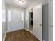 Inviting entryway with wood flooring, leading to the kitchen, creating a warm welcome at 460 E Kildare Nw Ave, Atlanta, GA 30318