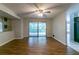 Open living room with sliding glass doors that lead to an outdoor deck at 460 E Kildare Nw Ave, Atlanta, GA 30318