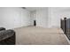 Spacious bonus room with plush carpeting and convenient access to storage closets and a hallway at 5316 Radford Loop, Fairburn, GA 30213