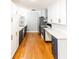 Updated kitchen with white subway tiles and stainless steel appliances at 674 Crespan Ct, Lawrenceville, GA 30044