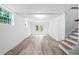 Spacious finished basement with natural light from the windows and double doors to the backyard at 2720 Cavalier Dr, Decatur, GA 30034