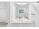 Modern bathroom features a large mirror, quartz countertop and vanity at 2720 Cavalier Dr, Decatur, GA 30034