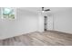 Bedroom with wood floors, a ceiling fan, closet, and window at 2720 Cavalier Dr, Decatur, GA 30034