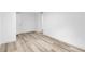 This bedroom features light-tone wood flooring at 2720 Cavalier Dr, Decatur, GA 30034