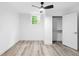 Bright basement bedroom has a fan, window, and closet space at 2720 Cavalier Dr, Decatur, GA 30034