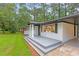 Welcoming front entrance featuring a covered porch and freshly painted exterior at 2720 Cavalier Dr, Decatur, GA 30034