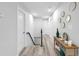 Bright hallway with wood floors and multiple doors at 2720 Cavalier Dr, Decatur, GA 30034