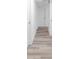 Narrow hallway with wood floors leading to other rooms at 2720 Cavalier Dr, Decatur, GA 30034