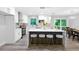 Modern kitchen with stainless appliances, island with seating, and stylish pendant lights at 2720 Cavalier Dr, Decatur, GA 30034