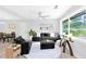 Bright living room with modern decor, lots of natural light and dining area in the background at 2720 Cavalier Dr, Decatur, GA 30034