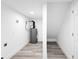 Utility room with wood floors and a water heater at 2720 Cavalier Dr, Decatur, GA 30034