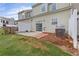 Backyard space featuring a patio and lawn, perfect for outdoor activities at 359 Azalea Cir, Cumming, GA 30028