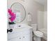 Bathroom featuring a vanity sink, toilet, and bathtub/shower combination, with neutral décor at 359 Azalea Cir, Cumming, GA 30028