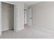 Bedroom featuring carpet floors, closet with folding doors, and neutral color palette at 359 Azalea Cir, Cumming, GA 30028