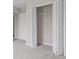 Bedroom closet with folding doors and carpet at 359 Azalea Cir, Cumming, GA 30028