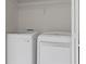 Convenient laundry room featuring modern washer and dryer units at 359 Azalea Cir, Cumming, GA 30028