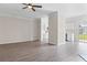 Spacious living area with hardwood floors, connecting seamlessly to the kitchen, with abundant natural light at 359 Azalea Cir, Cumming, GA 30028