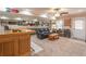 Finished basement complete with a custom bar, pool table, lounge area, and carpeted floors at 366 Coopers Pond Dr, Lawrenceville, GA 30044