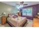 Comfortable bedroom featuring a ceiling fan and neutral walls at 366 Coopers Pond Dr, Lawrenceville, GA 30044
