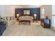 Cozy living room with plush sofas, a mirror, and side tables, creating a comfortable and inviting space at 366 Coopers Pond Dr, Lawrenceville, GA 30044