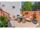 Cozy outdoor patio with comfortable seating, a fire pit, and decorative accents at 366 Coopers Pond Dr, Lawrenceville, GA 30044