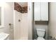 Bathroom with a shower stall featuring accent tile and vanity with sink at 3993 Forrest Ct, Atlanta, GA 30341