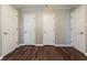 Bedroom featuring new hardwood floors and 3 closets at 3993 Forrest Ct, Atlanta, GA 30341