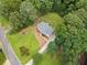 Aerial view of the house showing the driveway and landscaping at 5045 Shadow Wood Dr, Canton, GA 30114