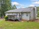 Rear of house showing the deck and yard at 5045 Shadow Wood Dr, Canton, GA 30114