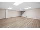 Spacious basement area featuring vinyl plank flooring and recessed lighting at 5045 Shadow Wood Dr, Canton, GA 30114