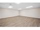 Finished basement featuring vinyl plank flooring and recessed lighting at 5045 Shadow Wood Dr, Canton, GA 30114
