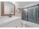 Updated bathroom featuring modern vanity and updated shower with glass doors at 5045 Shadow Wood Dr, Canton, GA 30114