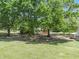 Spacious yard with large trees surrounding the property offers tons of privacy at 1797 Chandler Rd, Lawrenceville, GA 30045