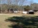 The property has a large open backyard with a small storage shed at 1797 Chandler Rd, Lawrenceville, GA 30045
