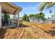 View of backyard featuring a covered patio and play area ready for Gathering fun and relaxation at 4913 Farm Valley Ne Dr, Woodstock, GA 30188