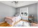 Charming bedroom with hardwood floors and a twin bed at 4913 Farm Valley Ne Dr, Woodstock, GA 30188