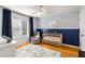 Cozy Bedroom with hardwood floors and natural light at 4913 Farm Valley Ne Dr, Woodstock, GA 30188