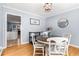 Charming dining area with a round table and views into the kitchen at 4913 Farm Valley Ne Dr, Woodstock, GA 30188
