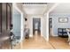 Inviting foyer with hardwood floors and views into multiple rooms at 4913 Farm Valley Ne Dr, Woodstock, GA 30188