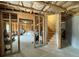 Unfinished basement area offering potential for a recreational room or additional storage space at 719 Lilac Mist Dr, Loganville, GA 30052