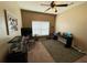 Functional bedroom with ample desk space, neutral walls and carpet at 719 Lilac Mist Dr, Loganville, GA 30052